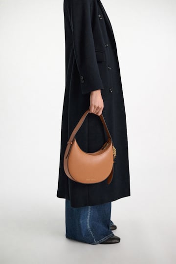 Dorothee Schumacher Half Moon Bag in soft calf leather with D-ring hardware tan