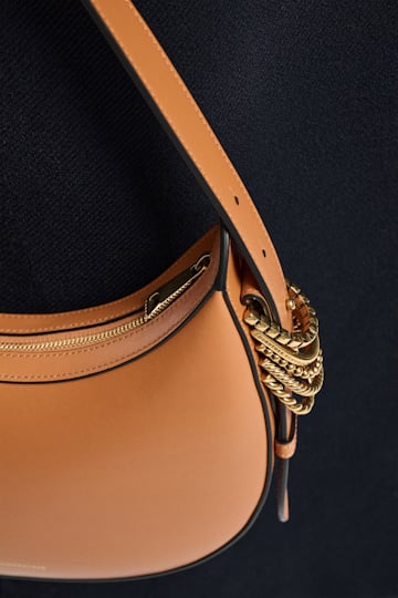 Dorothee Schumacher Half Moon Bag in soft calf leather with D-ring hardware tan