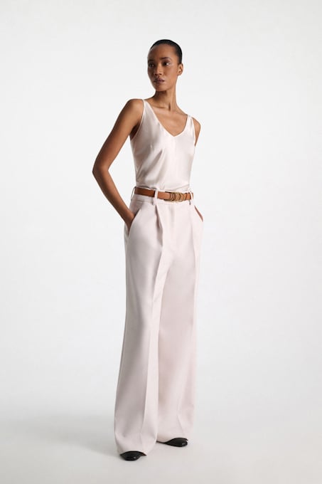 Pleated trousers with silk camisole